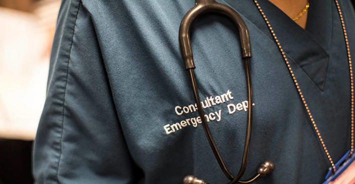 Consultant in scrubs