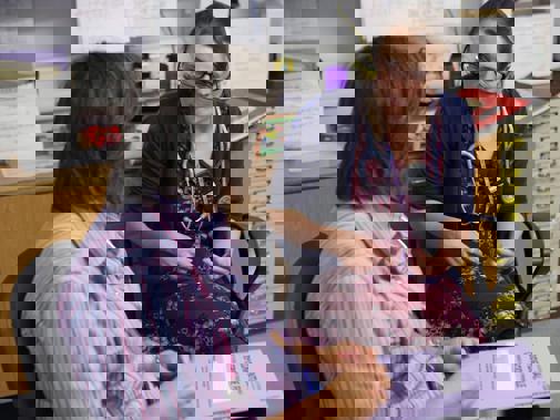 Female consultant with colleague