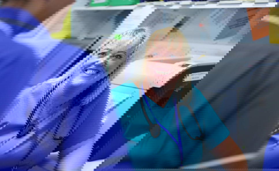 Female consultant with nurse