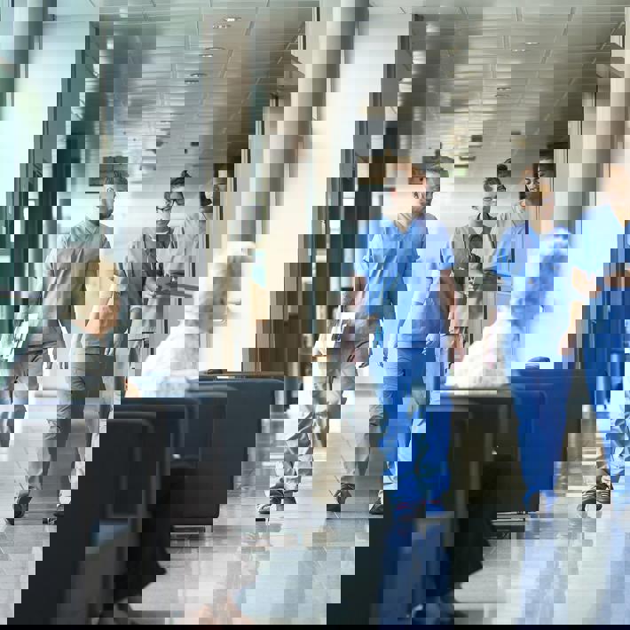 Group of trainee doctors in corridor