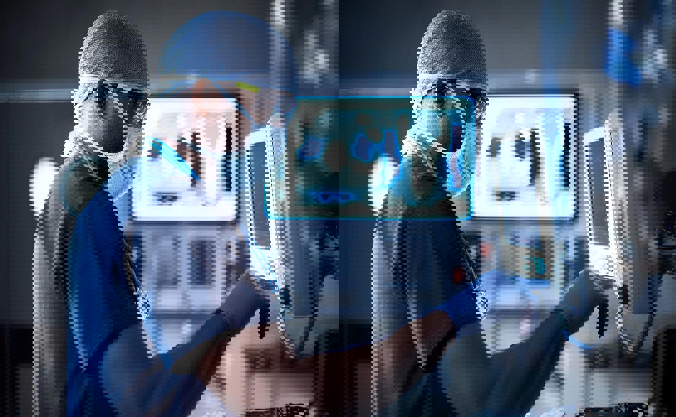 Doctor in scrubs using machine