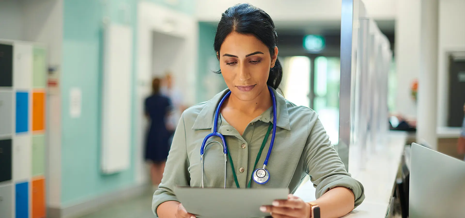 IMG Doctor Woman Reading File 16X9