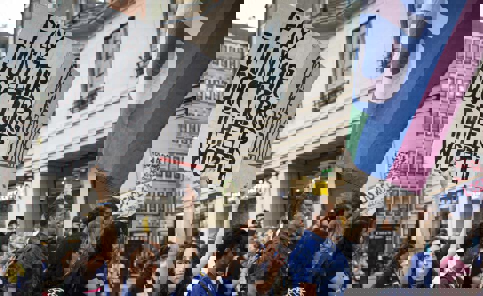 Junior doctor protestor with placard